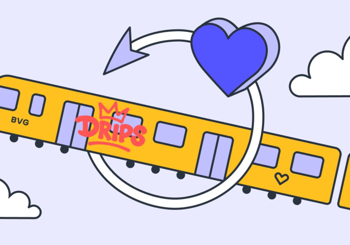 A Berlin metro train with Drips graffiti flies upwards through a circular arrow crowned with a heart.